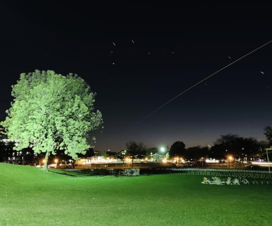 Long exposure shot of the Space Station flying overhead