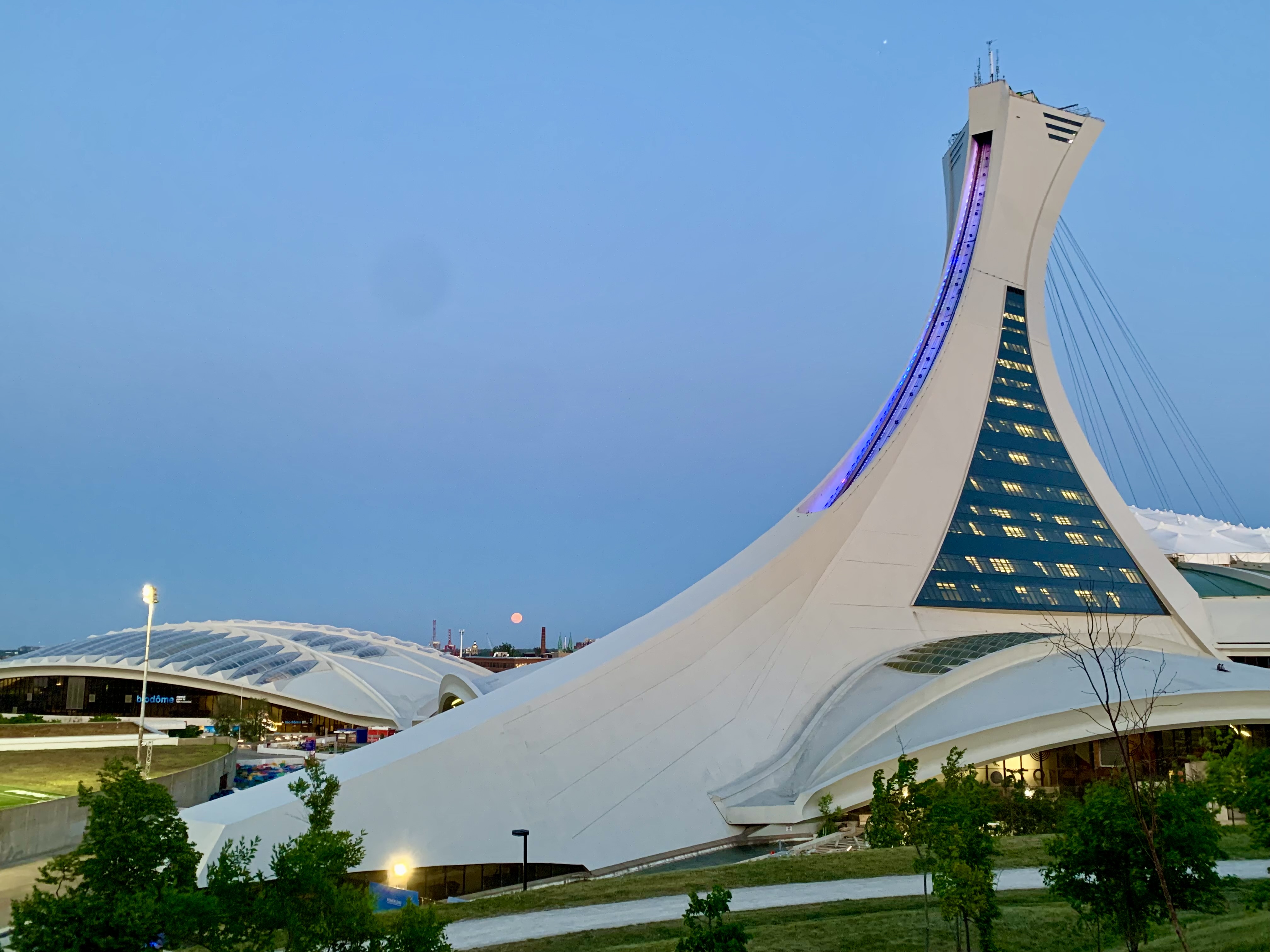 Moon rising behind the Olympic Stadium